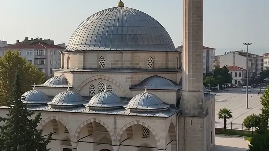 Haydarçavuş Camii seen from the air, dome and minaret above the town
